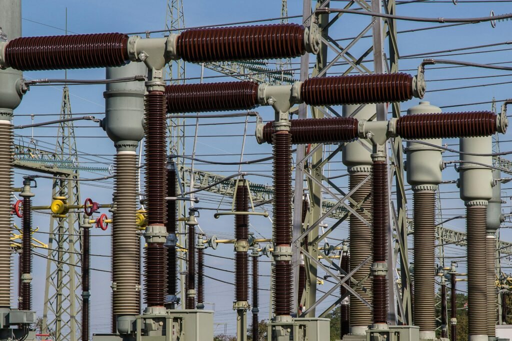 pexels-photo-236089-236089 Detailed view of high voltage electrical substation with transformers and power lines.